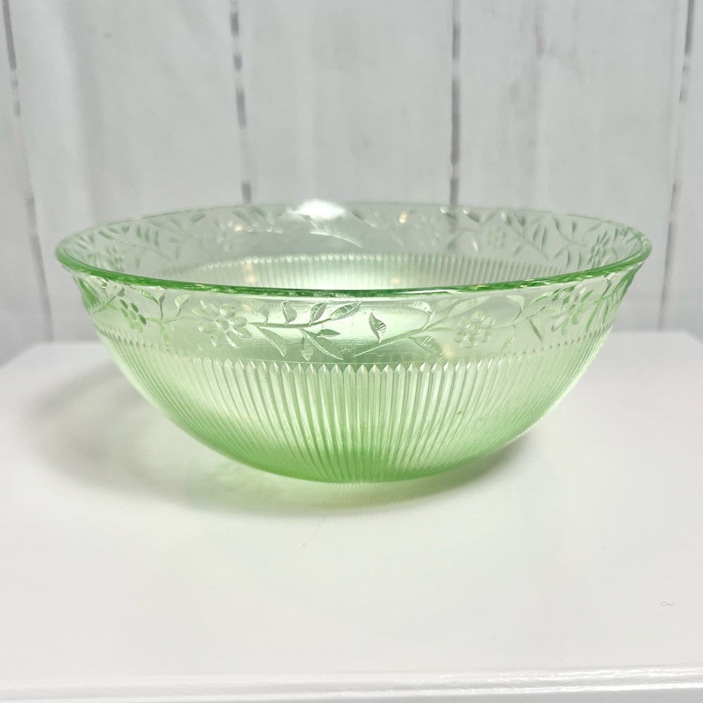 Vintage Green Depression Glass with ribbed design and a daisy border